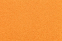 Texture Of Old Bright Orange Paper Background, Closeup. Structure Of Dense Carrot Cardboard