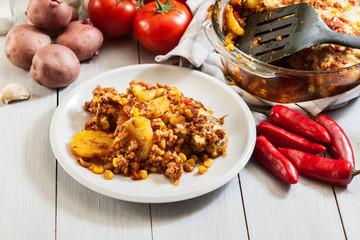 Wall Mural - Portion of mexican potato casserole with minced meat