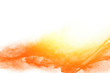 Yellow orange dust particles explosion on white background. Powder dust splash.