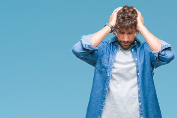 Poster - Handsome hispanic model man over isolated background suffering from headache desperate and stressed because pain and migraine. Hands on head.