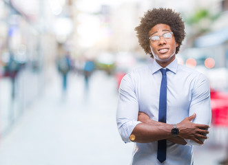 Afro american business man wearing glasses over isolated background smiling looking side and staring away thinking.