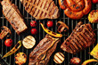 Fresh grilled meat steaks and vegetables on barbecue grate, top view