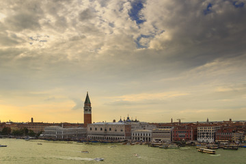 Wall Mural - Romantic sky of Venice: aerial view of Piazza San Marco or st Mark square, Campanile and Palazzo Ducale or Doge Palace. Italy, Europe.