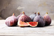 Fresh figs. Food Photo. whole and sliced figs on rustic background.
