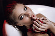 © irinaneva - beautiful sexy young blond woman in bath with rose petals