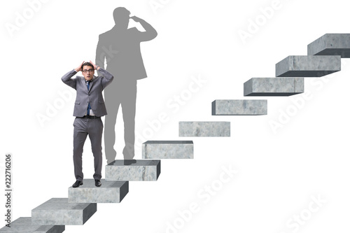 Businessman and his shadow in business concept Lerretsbilde