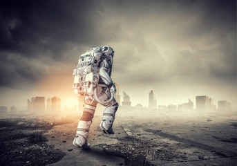 Wall Mural - Spaceman running fast. Mixed media