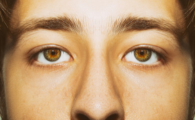 A beautiful insightful look man's eye. Close up shot.