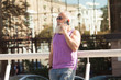 © lashkhidzetim - Trendy senior man using smartphone in downtown center outdoor - Mature fashion male having fun with new trends technology - Tech and joyful elderly lifestyle concept