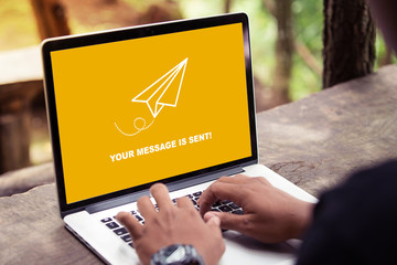 Your message is sent on laptop screen concept