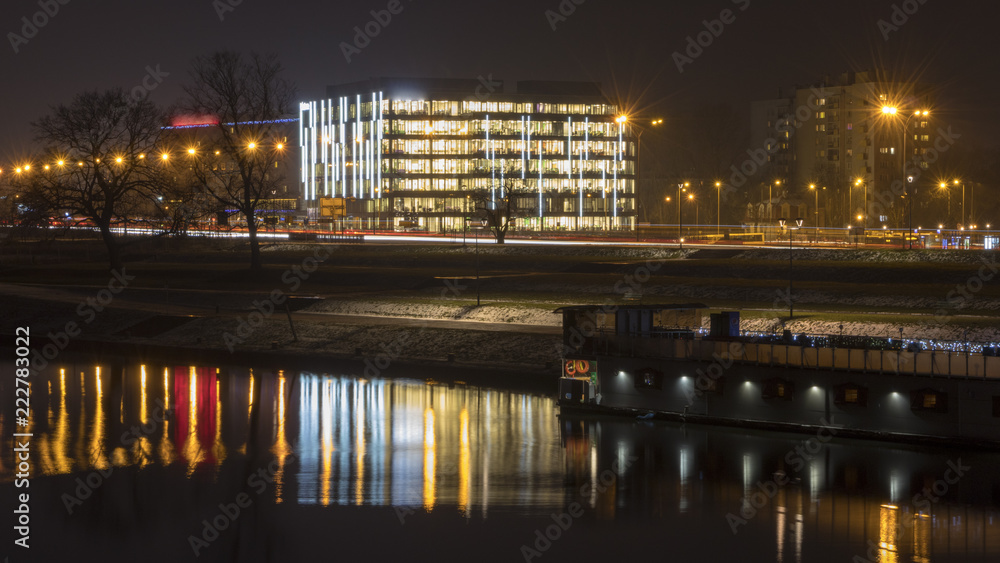 a bright office building by the river - obrazy, fototapety, plakaty 