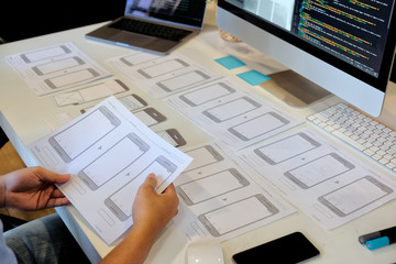 ux designer creative graphic planning application development a prototype smartphone layout.
