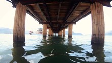 4k Video Under The Old Wwoden Pier At Sea