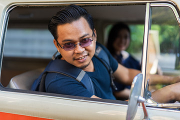 Wall Mural - young man in vintage van