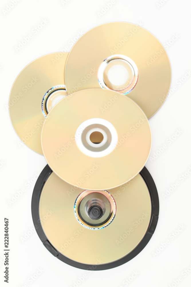 Stack Compact Discs Group of DVD discs, top view. Stack of blank compact disks over white ...