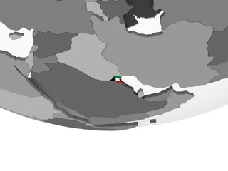 Kuwait with flag on globe