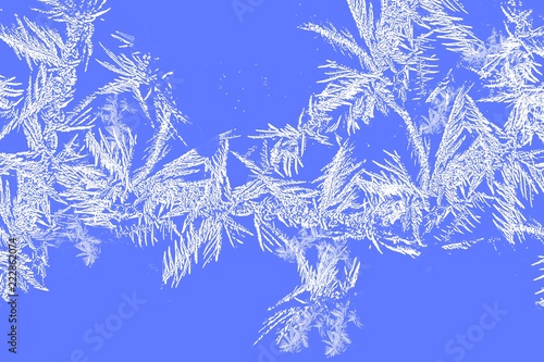 Fotografie, Obraz Frost and Snow border background of ice crystals and snowflakes on blue backgrou