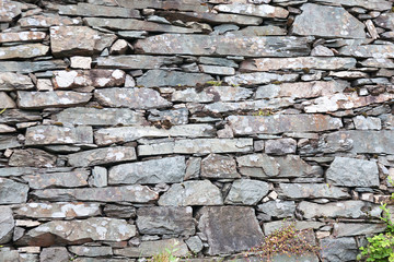 Natural background. Texture of a stone wall.