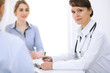 © rogerphoto - Doctor and patient at meeting. Medicine and health care concept