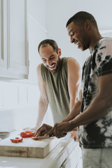 Wall Mural - Gay couple cooking in the morning