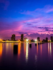 Wall Mural - beautiful nighttime long exposure at north avenue beach with building lights at sunset and pink, pur