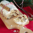 Traditional German cake Stollen, fruit bread with dried fruit and nuts, covered with powdered icing sugar, usually eaten during Christmas season and also called Weihnachtsstollen or Christstollen.
