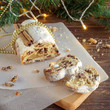 Traditional German cake Stollen, fruit bread with dried fruit and nuts, covered with powdered icing sugar, usually eaten during Christmas season and also called Weihnachtsstollen or Christstollen.