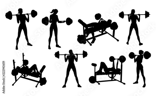 A woman in silhouette using...