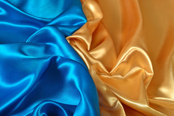 natural golden and blue satin fabric texture
