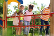 © Pixel-Shot - Cute little children having fun on playground outdoors