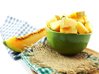 Poster - close up of cantaloupe melon slices on white background