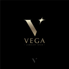 Vega Letter. Vega Star Astronomy Logo. Gold Letter V With Star. Jewelry Emblem. Optical Illusion Gold Monogram. Gold V Logo On A Dark Background. Monochrome Option.