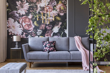 Real Photo Of A Floral Living Room Interior With A Wallpaper, Sofa And Plants