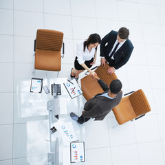 Wall Mural - view from the top.the handshake business partners at a business meeting