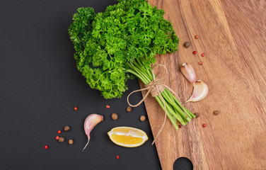 Sticker - A bunch of fresh parsley on a black board