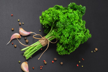 Sticker - A bunch of fresh parsley on a black board