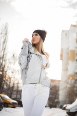 Beautiful young woman posing in winter