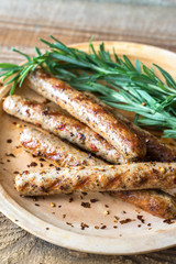 Wall Mural - Grilled sausages with rosemary