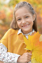 Sticker - Portrait of cute little girl smiling in park