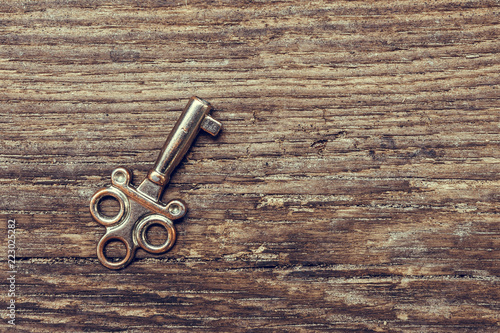 Old Antique Key And A Set Of Vintage Keys On A Wooden