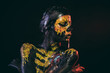 Halloween woman with skull face paint drool saliva