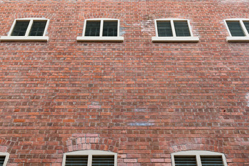 Canvas Print - Red brick building