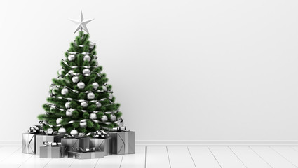 decorated christmas tree with gift boxes in white room