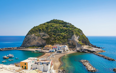 Wall Mural - Giant green rock near small village Sant'Angelo on Ischia island, Italy