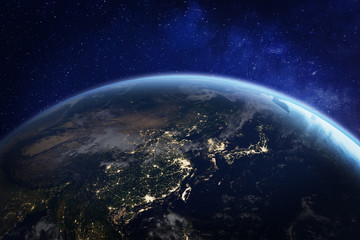 Wall Mural - asia at night from space with city lights showing human activity in china, japan, south korea, taiwa