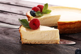Homemade cheesecake with fresh raspberries and mint for dessert - healthy organic summer dessert pie cheesecake. Vanilla Cheese Cake