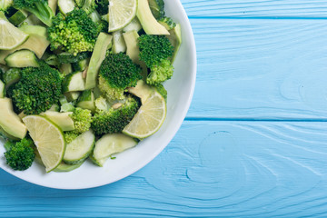 Wall Mural - Green salad with avocado