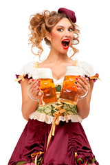 Wall Mural - Oktoberfest / Creative concept photo of Oktoberfest waitress wearing a traditional Bavarian costume with beer isolated on white background.