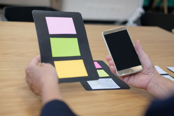 user experience, ux designer designing web on smartphone layout. ui planning mobile application. dev