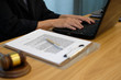 © 88studio - judge work with computer. legal law gavel at courtroom. lawyer attorney justice at court